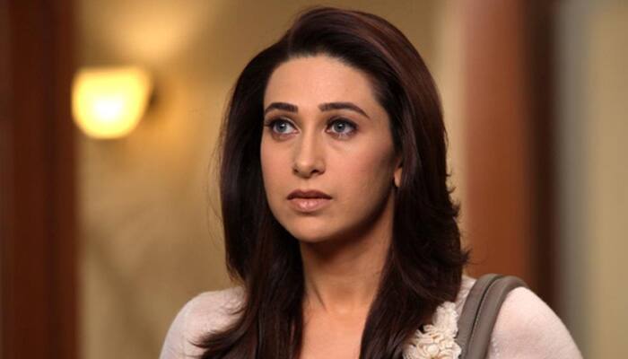 Karisma Kapoor avoids question on divorce, says not ready for films