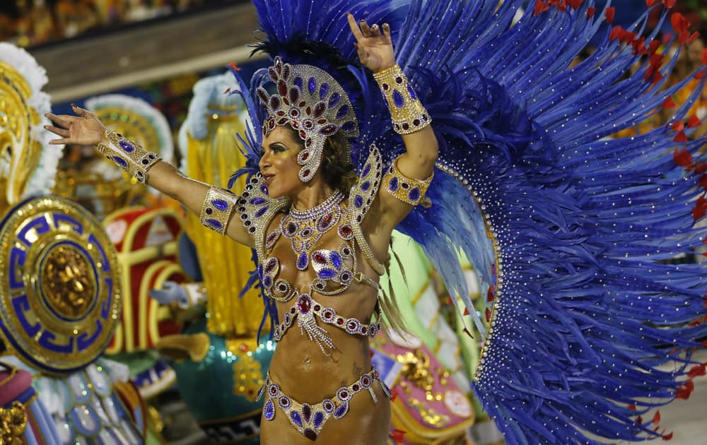 Performer from the Uniao da Ilha samba school parades during Carnival celebrations at the Sambadrome in Rio de Janeiro, Brazil.
