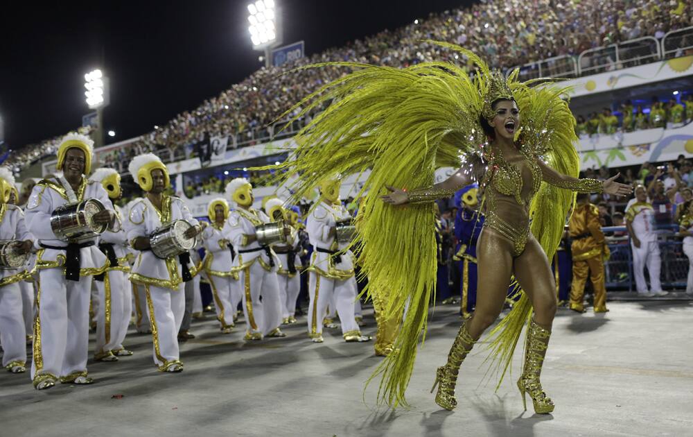 Drum queen Bianca Leao, from Uniao da Ilha samba school, dances during the Carnival parade at the Sambadrome in Rio de Janeiro, Brazil.