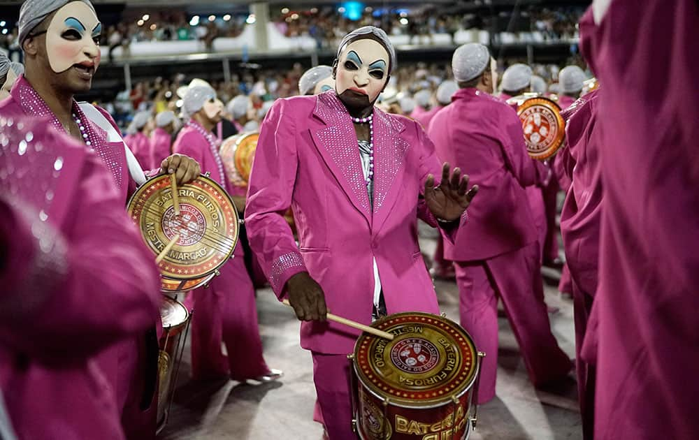 Members of the Salgueiro samba school perform during a Carnival parade inside the Sambadrome of Rio de Janeiro, Brazil.