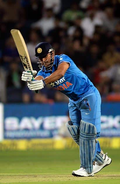 MS Dhoni plays a stroke during the first T20 match between India and Sri Lanka in Pune.