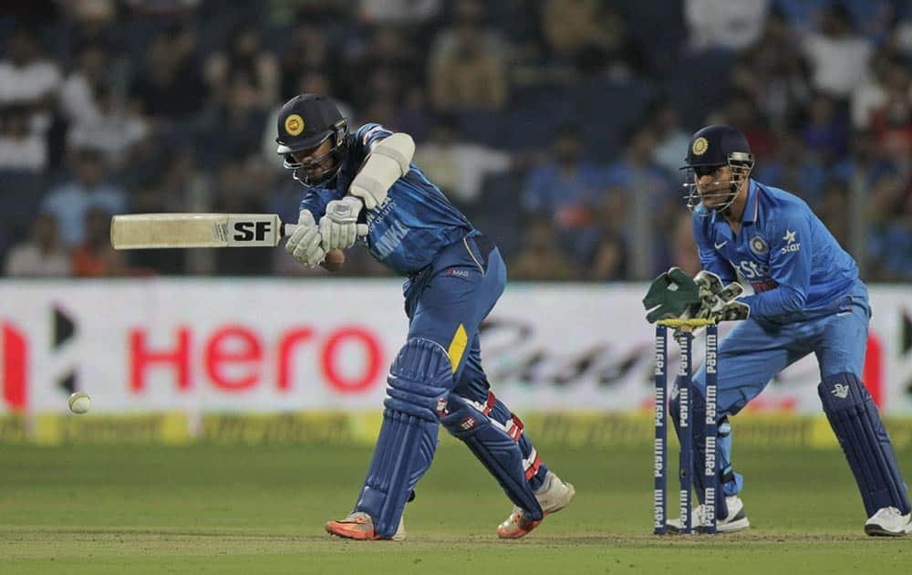 Sri Lanka s Dinesh Chandimal bats during their first Twenty20 cricket match against India  in Pune.