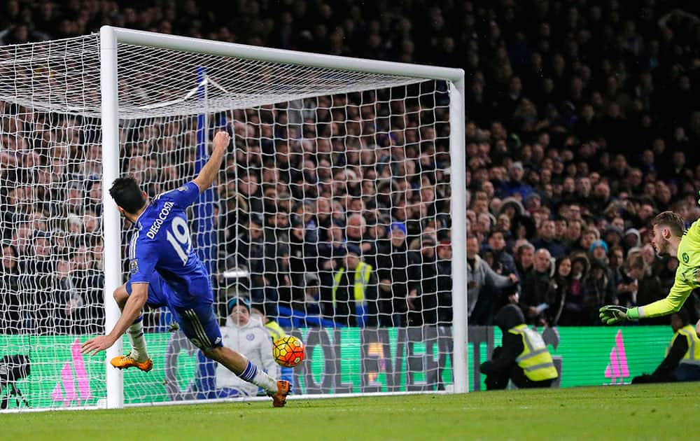 Chelsea's Diego Costa scores a goal during the English Premier League soccer match between Chelsea and Manchester United at Stamford Bridge stadium in London.