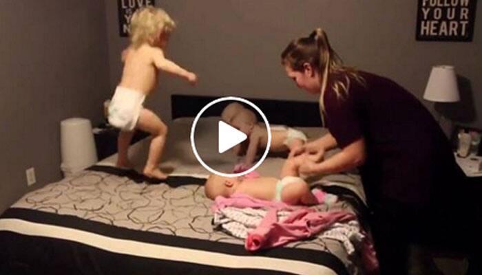 Watch: Mother puts her triplets and toddler to bed – Viral video