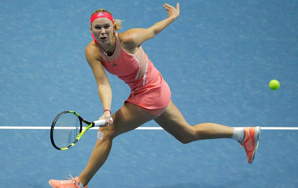 Caroline Wozniacki of Denmark returns the ball to Dominika Cibulkova of Slovakia during the St. Petersburg Ladies Trophy-2016 tennis tournament match in St.Petersburg, Russia.