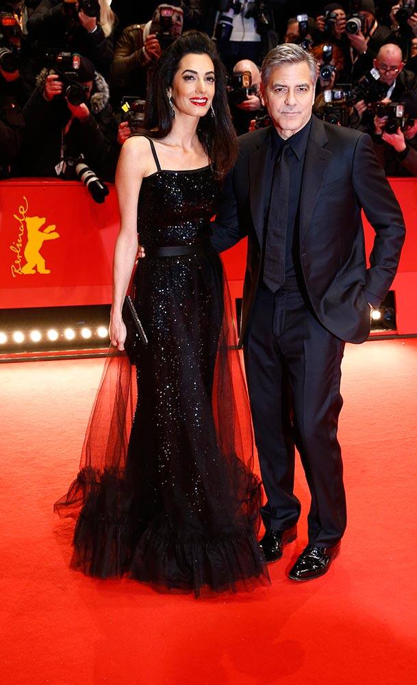 US actor George Clooney and his wife Amal Clooney arrive at the red carpet for 'Hail, Caesar!' the opening film of the 2016 Berlinale Film Festival in Berlin.