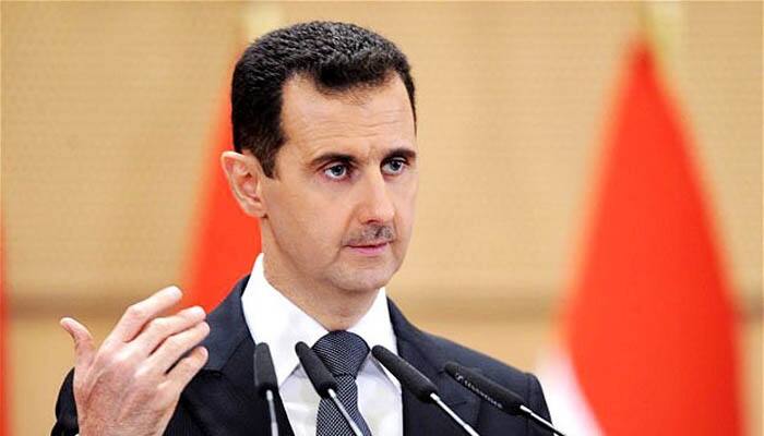 Assad vows to retake whole country, warns could `take long time`