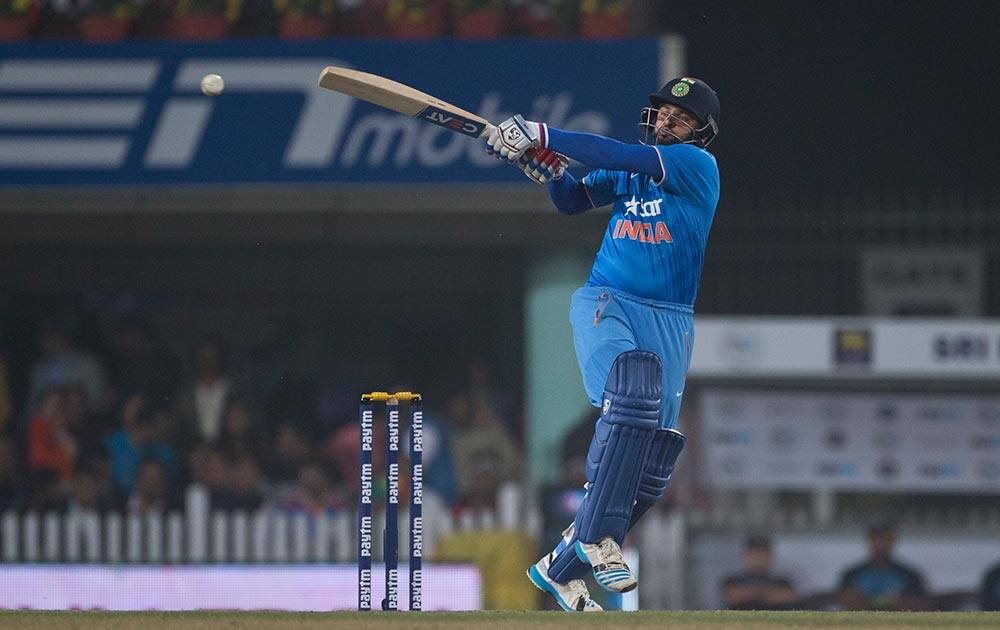 Suresh Raina plays a ball against Sri Lanka during the second T20 match of a three match series between the two countries, in Ranchi.