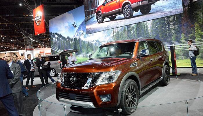 Attendees view a Nissan display at the Chicago Auto Show.

