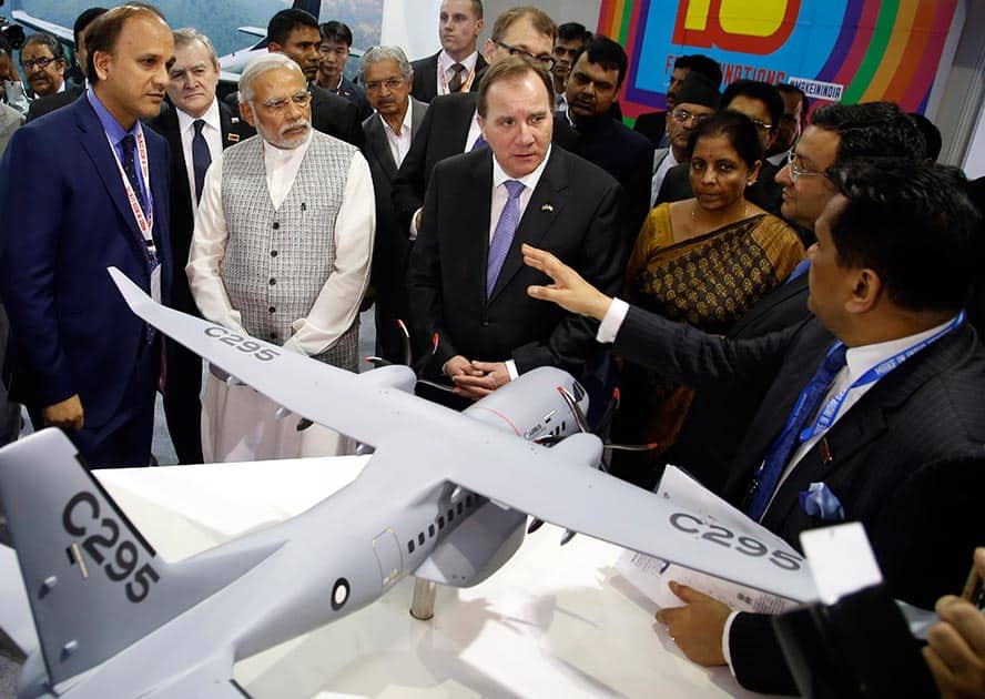 Prime Minister Narendra Modi, second from left and Sweden Prime Minister Stefan Löfven, visit a stall after the inauguration of the ‘Make in India’ center in Mumbai.
