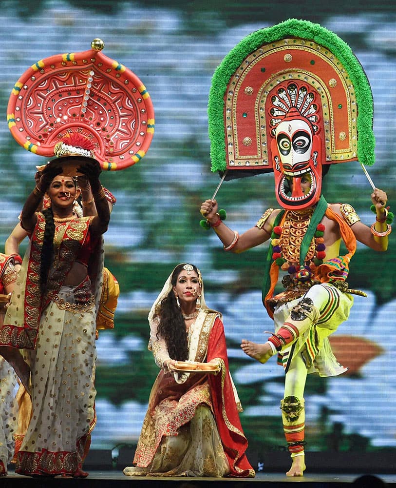 Artistes perform during the inauguration of the Make in India Week in Mumbai.