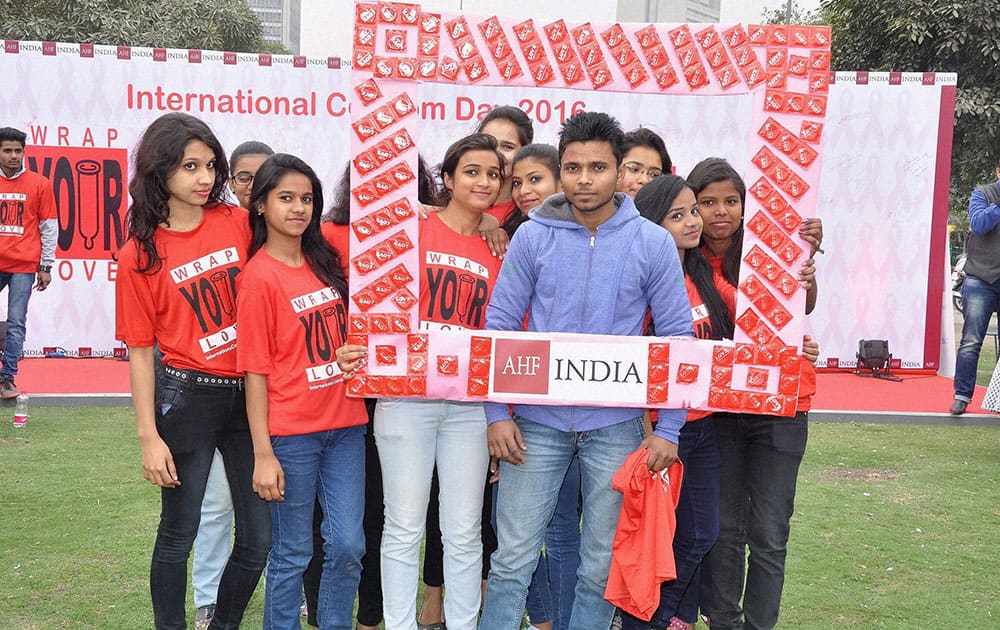 AIDS Healthcare Foundation volunteers observing International Condom Day in Cannaught Place, New Delhi.