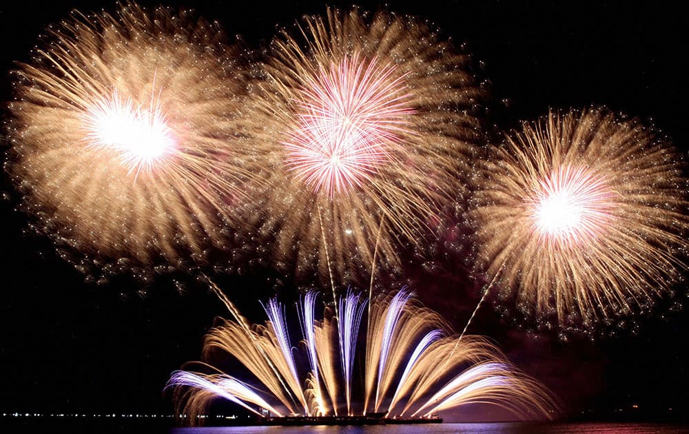 Fireworks from Portugal light up the night sky at the start of the 7th Philippine International Pyromusical competition at the seaside Mall of Asia at suburban Pasay city, south of Manila, Philippines.