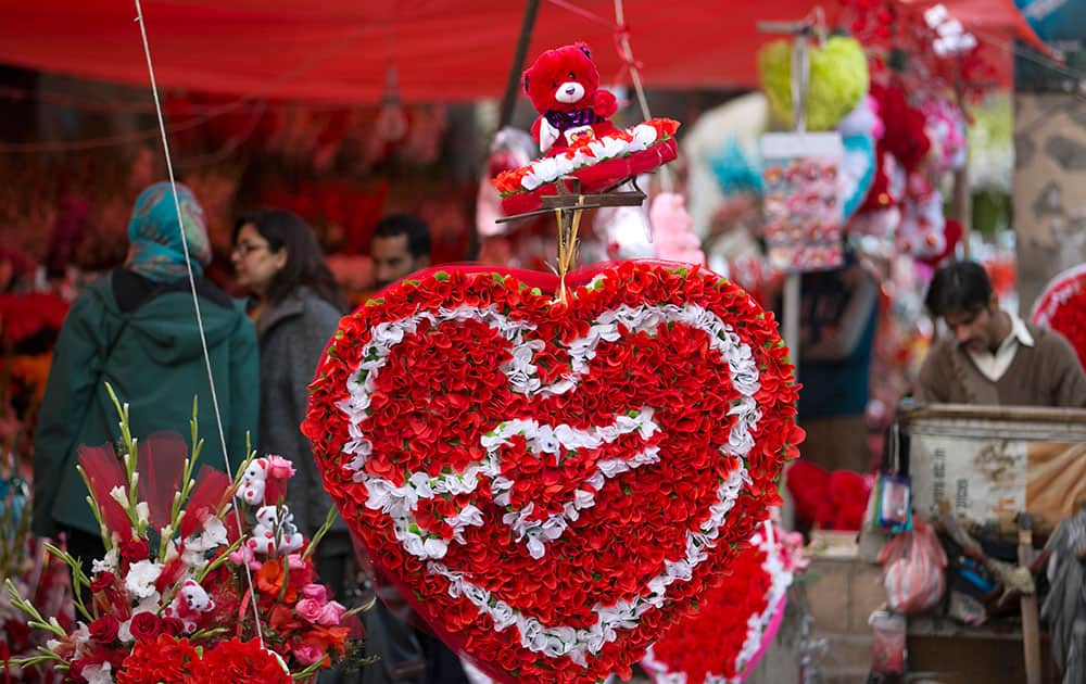 People buy flowers to celebrate the upcoming Valentine's Day in Islamabad, Pakistan.