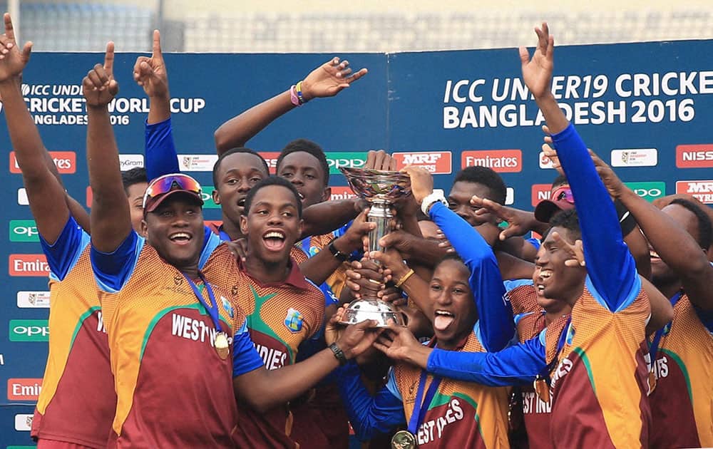 West Indies players celebrate after winning the ICC Under 19 Cricket World Cup final against India in Mirpur, outskirts of Dhaka, Bangladesh.