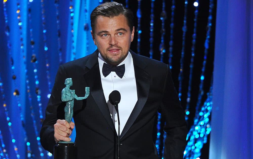 Leonardo DiCaprio accepts the award for outstanding male actor in a leading role for “The Revenant” at the 22nd annual Screen Actors Guild Awards at the Shrine Auditorium & Expo Hall.