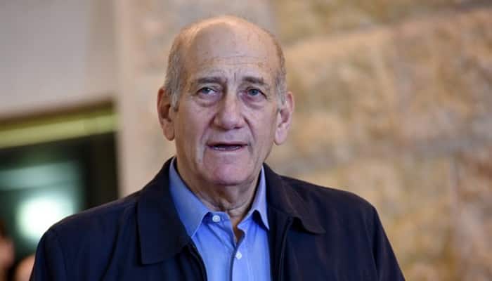 Israel ex-PM Olmert enters prison to begin sentence for corruption 