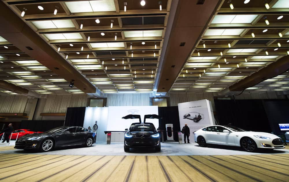 Tesla vehicles are shown at the 2016 Canadian International Autoshow in Toronto on Thursday, Feb. 11, 2016. 