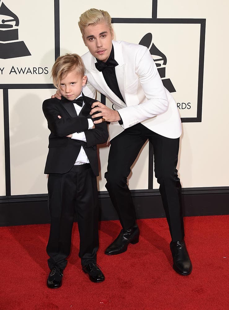 Jaxon Bieber and Justin Bieber arrive at the 58th annual Grammy Awards at the Staples Center, in Los Angeles.