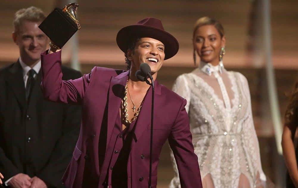 Bruno Mars accept the award for record of the year for 'Uptown Funk' at the 58th annual Grammy Awards.