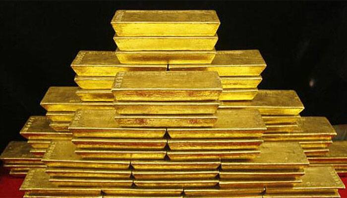 Gold futures falls by Rs 241 to Rs 28,449 per 10 grams