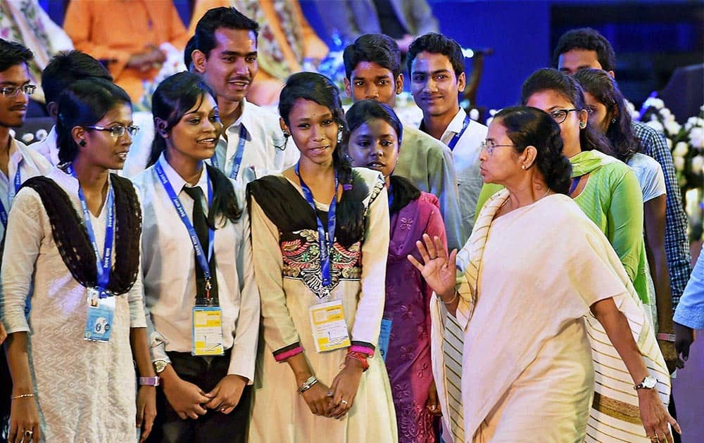 West Bengal Chief Minister Mamata Banerjee with the students during inauguration of Utkarsh Bangla 2016 in Kolkata.