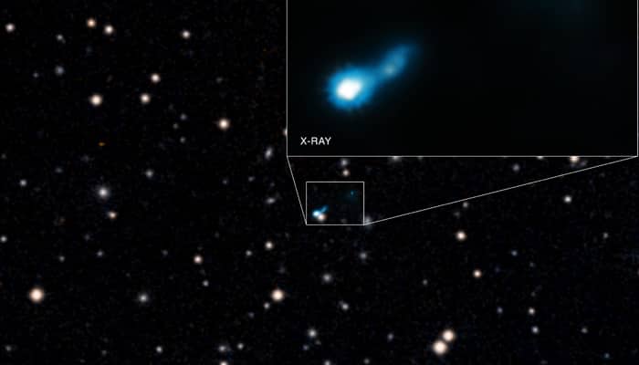 Distant black hole jet discovered in glow of Big Bang!