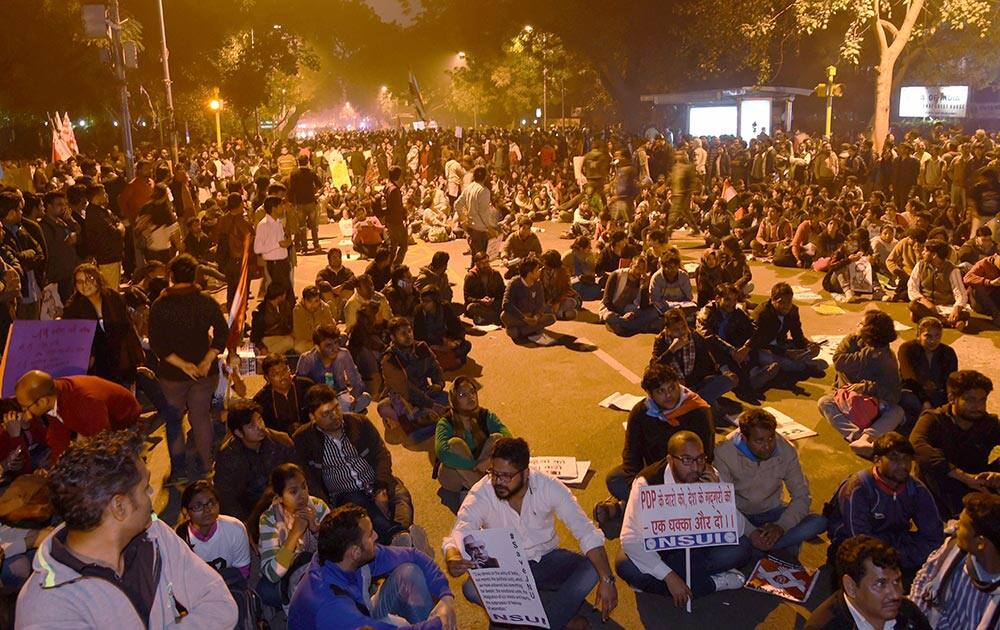 Activists and students from various organisations at a dharna at Jantar Mantar after their march from Mandi House to Jantar Mantar in solidarity with the JNUSU President Kanhaiya Kumar, in New Delhi.