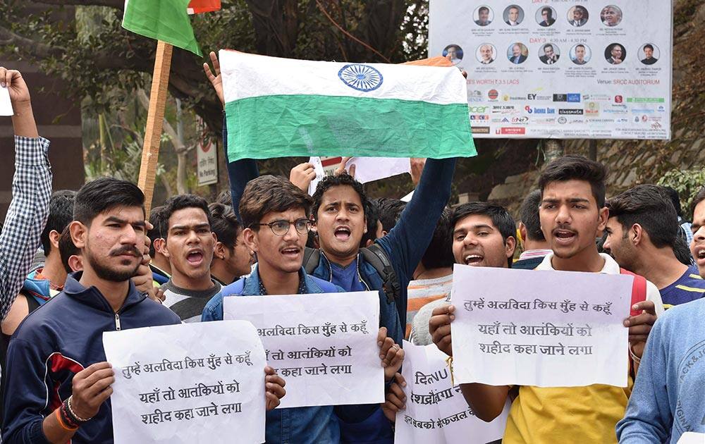 Students of Jnanapith Sanskrit Vishwa Vidyalaya protest outside JNU in New Delhi.