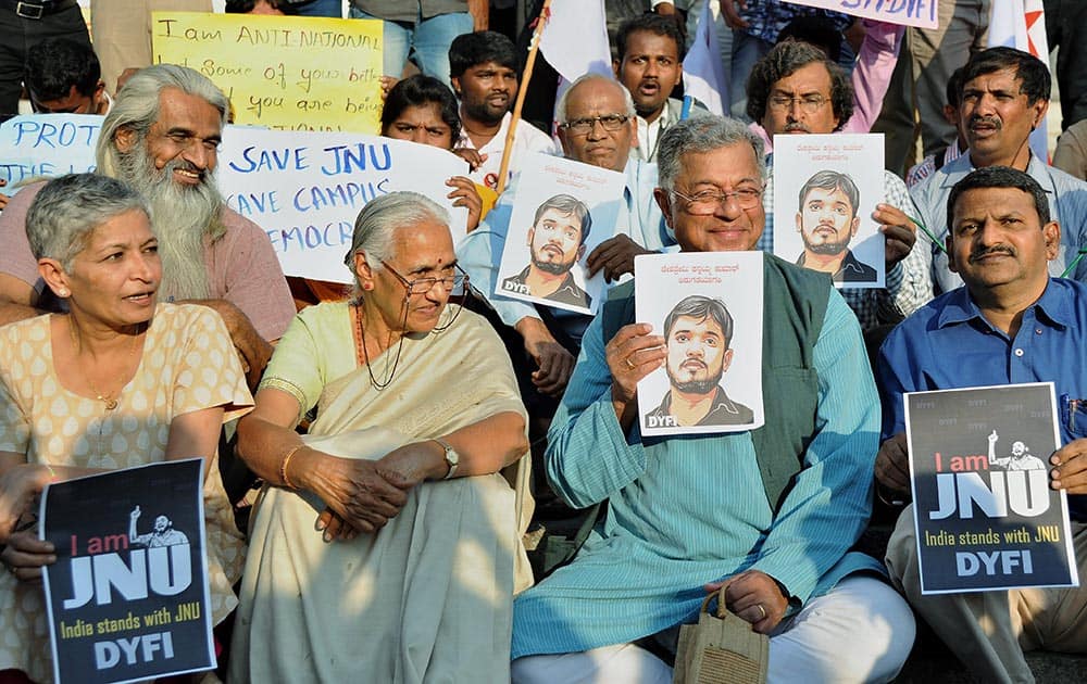 Playwright Girish Karnad with members of DYFI protesting against the arrest of JNU students leader Kanhaiya Kumar in Bengaluru.