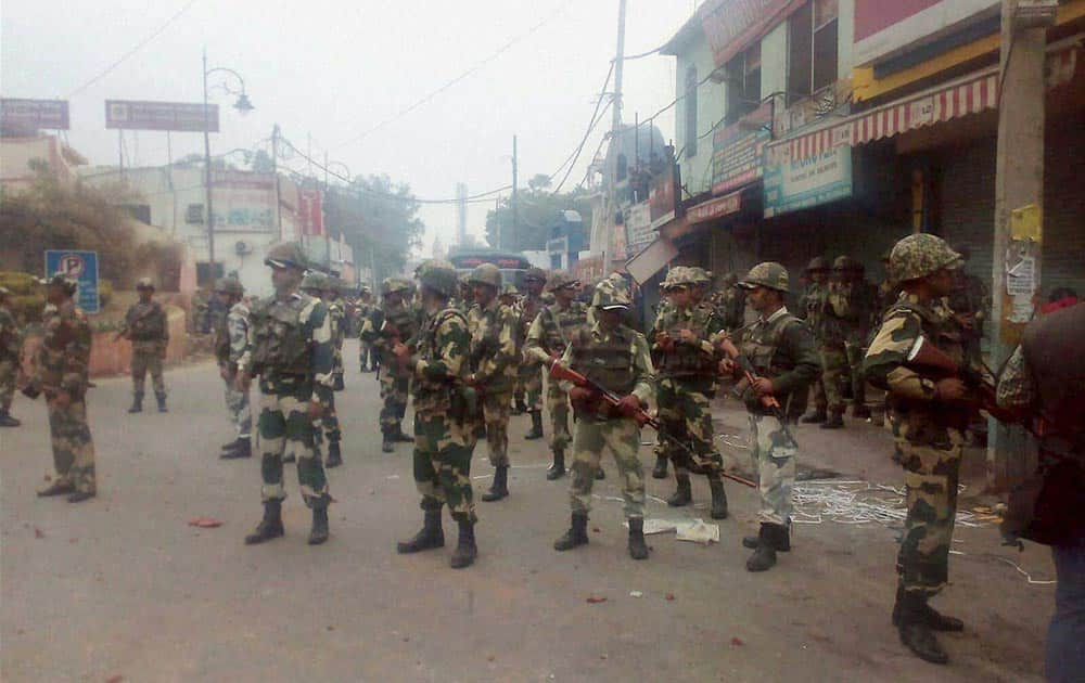 Security forces personnel patrol in the view of incidents of violence due to Jat agitation for reservation, in Rohtak.