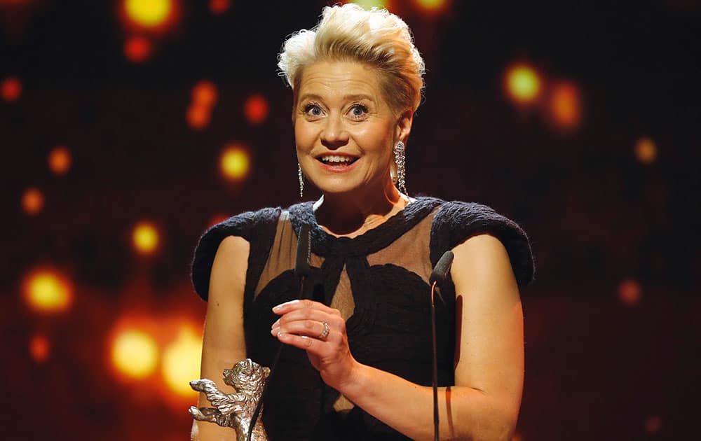 Actress Trine Dyrholm addresses the audience after winning the silver bear award, during the award ceremony at the 2016 Berlinale Film Festival in Berlin.