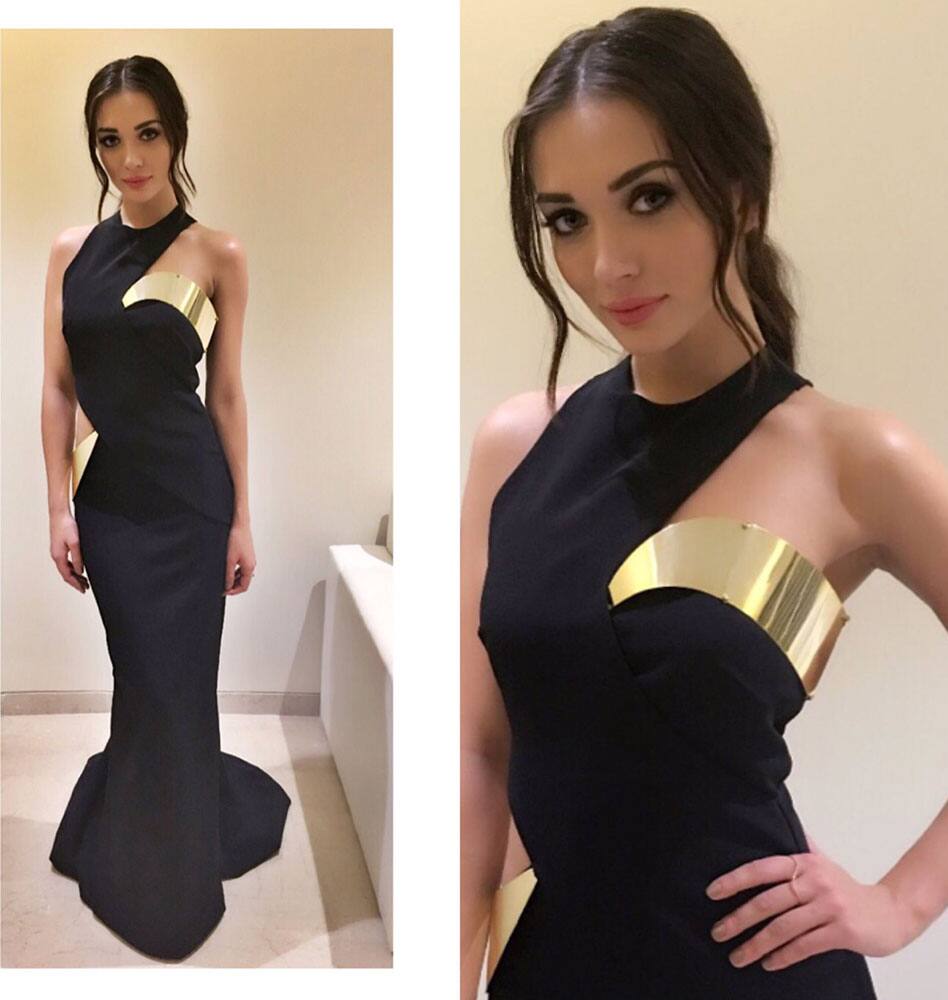 Amy Jackson ‏:- Ready to shimmy along the red carpet for @zeecinema awards tonight wearing a super sexy @Monisha_Jaising gown -twitter
