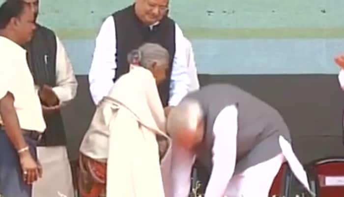PM Narendra Modi touches feet of 104-year-old woman – Watch