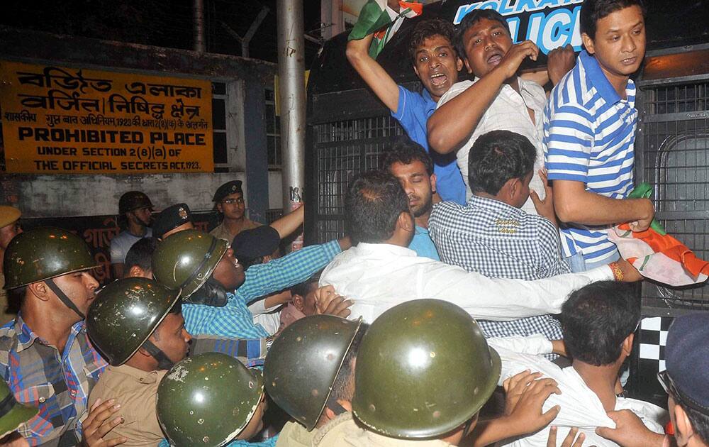 Youth Congress activists being arrested by police for showing black flags to Prime Minister Narendra Modi, near Gaudiya Math, the PMs programme venue, in Kolkata.