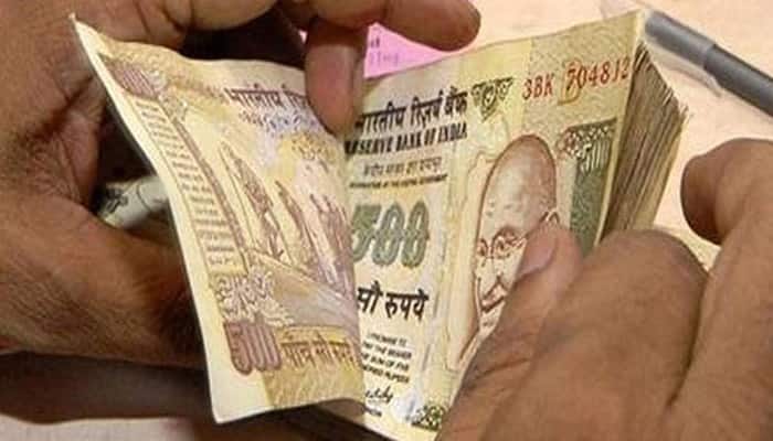 Rupee dips 23 paise to fresh 30-month low against USD