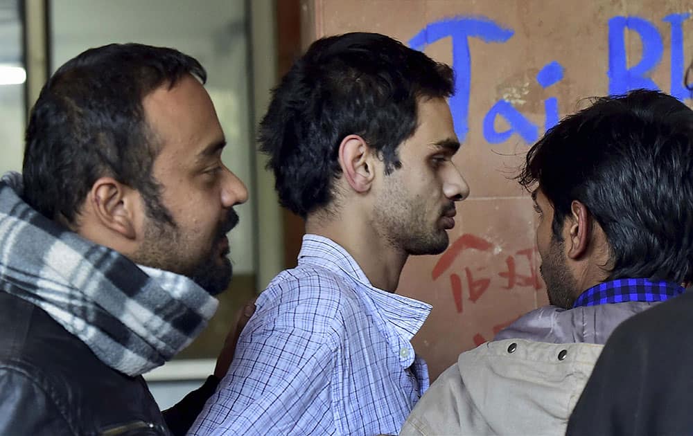 Student activist Umar Khalid (C) on the campus of Jawaharlal Nehru University (JNU) in New Delhi on Monday. Khalid, one of the five students accused of sedition, returned to the University campus.