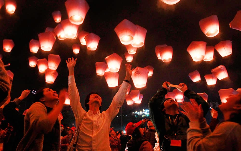Hundreds of people release lanterns into the air, in hopes of good fortune and prosperity at the traditional lantern festival during the Chinese New Year in the Pingxi district of New Taipei City, Taiwan.