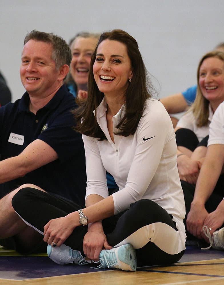 Britains Kate, the Duchess of Cambridge takes part in a tennis workshop with Andy Murrays mother Judy at Craigmount High School in Edinburgh, as she carries out a series of engagements in the Scottish capital. 