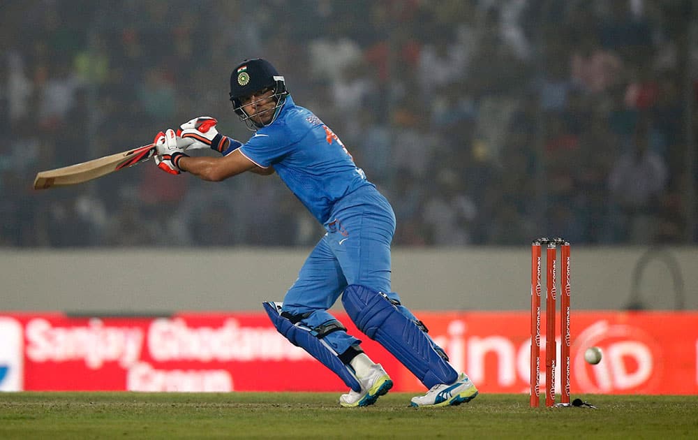  Indias Yuvraj Singh plays a shot against Bangladesh during the Asia Cup Twenty20 international cricket match in Dhaka, Bangladesh.