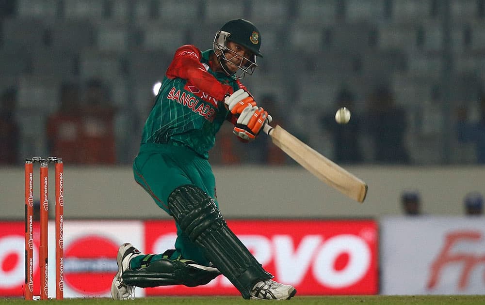 Bangladesh’s Taskin Ahmed plays a shot against India during the Asia Cup Twenty20 international cricket match in Dhaka, Bangladesh.