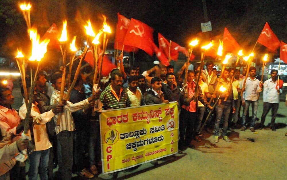 CPI activists carried torch parade demanding for release of JNU student Kanhaiya Kumar arrested under anti -national statement at Chikmagalurin Karnataka.