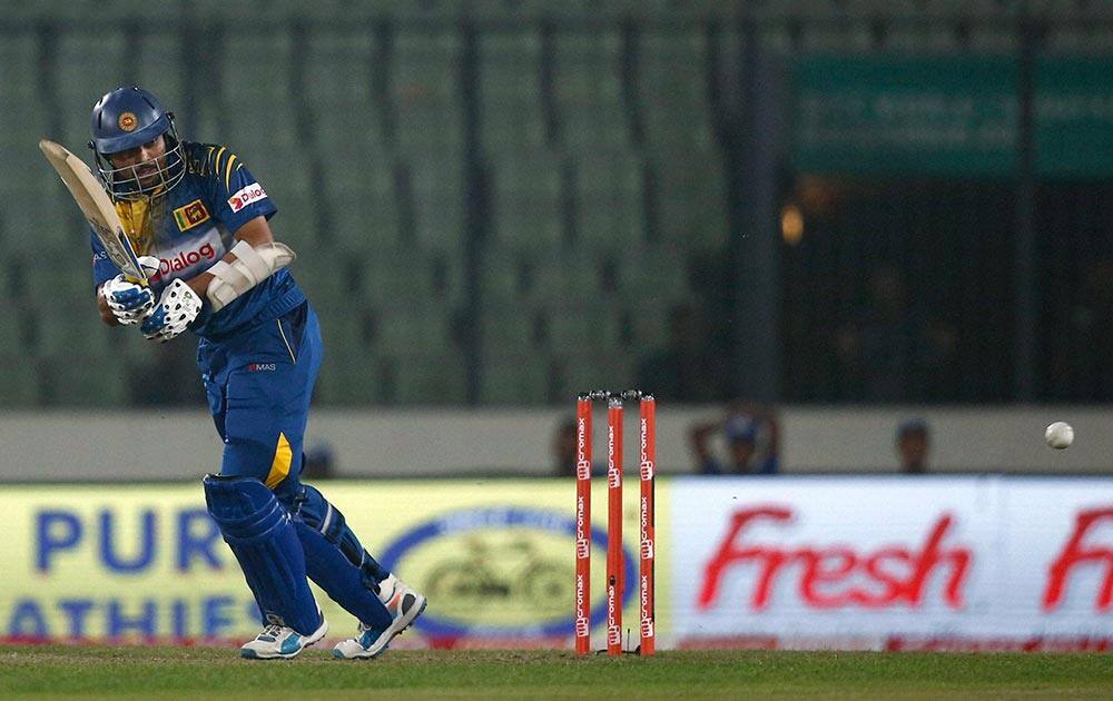 Sri Lankan cricketer Tillakaratne Dilshan plays a shot during the Asia Cup Twenty20 international cricket match against United Arab Emirates in Dhaka.