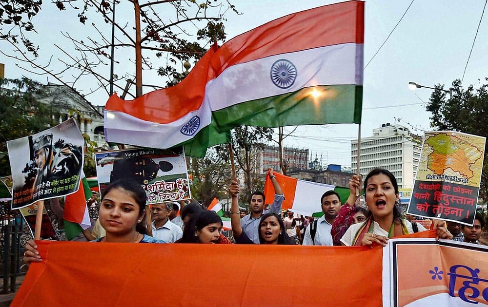 Activists participate in March for Bharat with the Nation Flag to stop anti-national activities, in Kolkata.