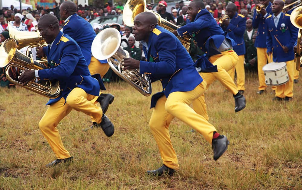 Members of a band perform during celebrations to mark Zimbabwean President Robert Mugabe's 92nd Birthday celebrations in Masvingo about 300 kilometres south of Harare.