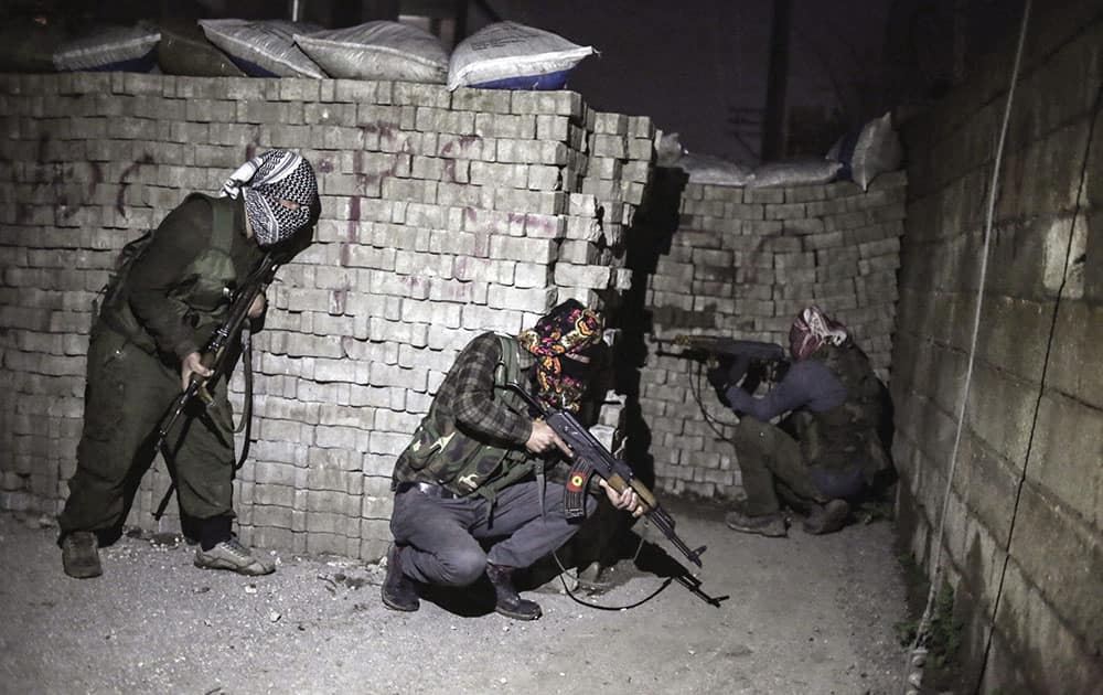 militants of Kurdistan Workers Party, PKK, move to attack Turkish security forces in Nusaybin, south Turkey.