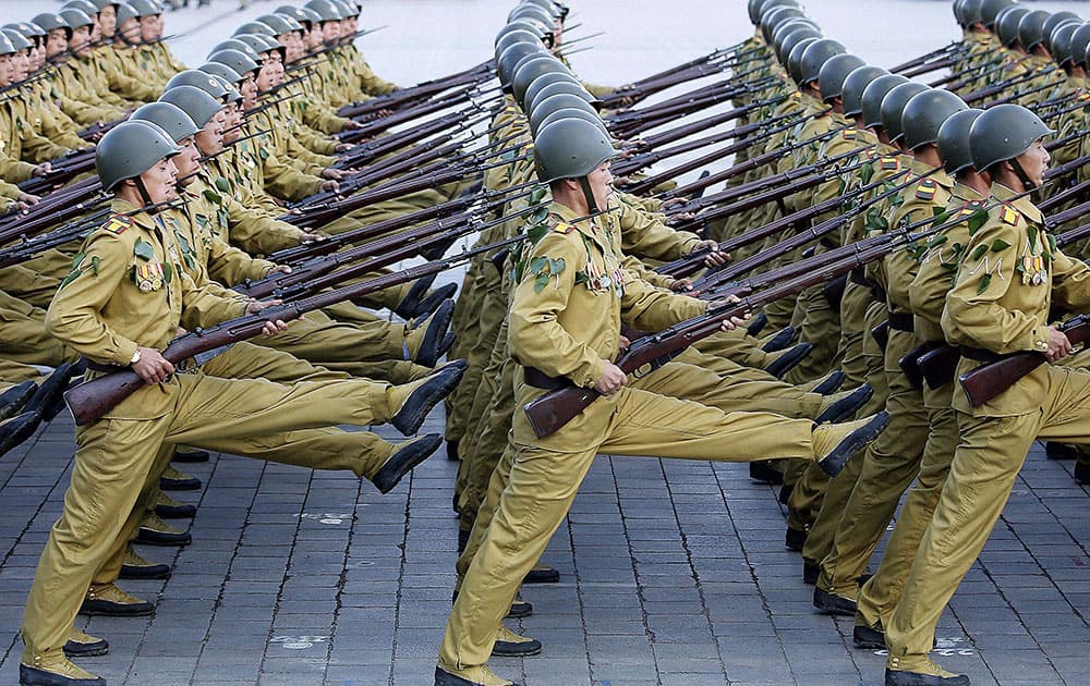 North Korean soldiers march across the Kim Il Sung Square during a military parade in Pyongyang, North Korea. 