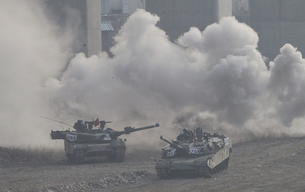 South Korean army K-1 tanks move during an annual exercise in Yeoncheon, near the border with North Korea.