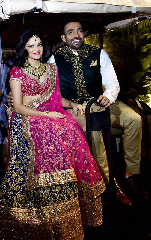 Newly wed cricketer Robin Uthappa and his bride Sheetal Gautam before a reception in Bengaluru.