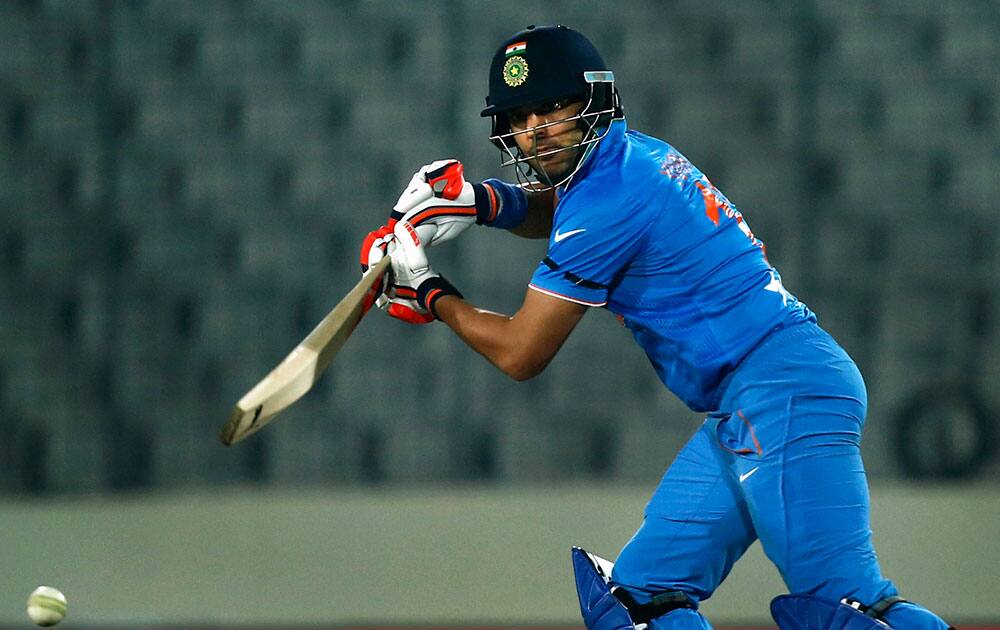 Yuvraj Singh plays a shot during the Asia Cup Twenty20 international cricket match against United Arab Emirates in Dhaka, Bangladesh.